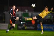20 October 2023; Danny Grant of Bohemians in action against Sam Curtis of St Patrick's Athletic during the SSE Airtricity Men's Premier Division match between Bohemians and St Patrick's Athletic at Dalymount Park in Dublin. Photo by Tyler Miller/Sportsfile