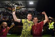 20 October 2023; Galway United goalkeeper Brendan Clarke and Galway United kitman Kenny Flaherty celebrate with the trophy after the SSE Airtricity Men's First Division match between Galway United and Wexford at Eamonn Deacy Park in Galway. Photo by Stephen McCarthy/Sportsfile