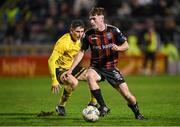 20 October 2023; James McManus of Bohemians in action against Kian Leavy of St Patrick's Athletic during the SSE Airtricity Men's Premier Division match between Bohemians and St Patrick's Athletic at Dalymount Park in Dublin. Photo by Seb Daly/Sportsfile