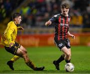 20 October 2023; James McManus of Bohemians in action against Kian Leavy of St Patrick's Athletic during the SSE Airtricity Men's Premier Division match between Bohemians and St Patrick's Athletic at Dalymount Park in Dublin. Photo by Seb Daly/Sportsfile