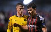 20 October 2023; James Clarke of Bohemians and Chris Forrester of St Patrick's Athletic during the SSE Airtricity Men's Premier Division match between Bohemians and St Patrick's Athletic at Dalymount Park in Dublin. Photo by Seb Daly/Sportsfile
