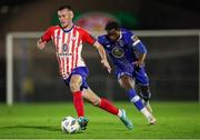 20 October 2023; Lee Devitt of Treaty United in action against Roland Idowu of Waterford during the SSE Airtricity Men's First Division match between Waterford and Treaty United at RSC in Waterford. Photo by Michael P Ryan/Sportsfile