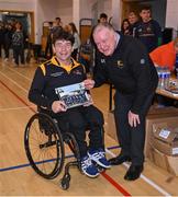 21 October 2023; GAA Carlow county chairperson Jim Bolger presents Ireland player Paul Hannon with a commemorative plaque for their trip to Prague earlier this year before the 2023 Wheelchair Hurling / Camogie All Ireland Finals at SETU Carlow Sports Hall in Carlow. Photo by Ben McShane/Sportsfile
