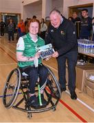 21 October 2023; GAA Carlow county chairperson Jim Bolger presents Ireland player Melanie Griffith of Leinster with a commemorative plaque for their trip to Prague earlier this year before the 2023 Wheelchair Hurling / Camogie All Ireland Finals at SETU Carlow Sports Hall in Carlow. Photo by Ben McShane/Sportsfile