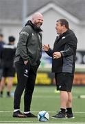21 October 2023; Connacht head coach Peter Wilkins, left, and Ospreys head coach Toby Booth in conversation before the United Rugby Championship match between Connacht and Ospreys at The Sportsground in Galway. Photo by Sam Barnes/Sportsfile