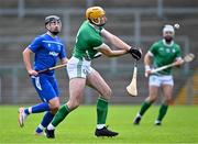21 October 2023; David Fitzgerald of Ireland in action against Daniel McCuish of Scotland during the 2023 Hurling Shinty International Game between Ireland and Scotland at Páirc Esler in Newry, Down. Photo by Piaras Ó Mídheach/Sportsfile