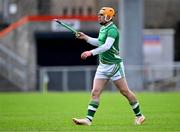 21 October 2023; Cillian Kiely of Ireland looks for a replacement hurl during the 2023 Hurling Shinty International Game between Ireland and Scotland at Páirc Esler in Newry, Down. Photo by Piaras Ó Mídheach/Sportsfile