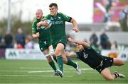 21 October 2023; Tom Farrell of Connacht in action against Reuben Morgan-Williams of Ospreys during the United Rugby Championship match between Connacht and Ospreys at The Sportsground in Galway. Photo by Tyler Miller/Sportsfile