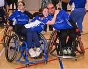 21 October 2023; Munster players Ellen Sheehy, left, and James McCarthy celebrate after the 2023 Wheelchair Hurling / Camogie All Ireland Final match between Ulster and Munster at SETU Carlow Sports Hall in Carlow. Photo by Ben McShane/Sportsfile