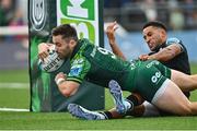 21 October 2023; Caolin Blade of Connacht dives over to score his side's second try despite the efforts of Keelan Giles of Ospreys during the United Rugby Championship match between Connacht and Ospreys at The Sportsground in Galway. Photo by Tyler Miller/Sportsfile