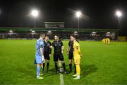 20 October 2023; Referee Eoghan O'Shea with Galway United captain Brendan Clarke and Wexford captain Danny Furlong during the SSE Airtricity Men's First Division match between Galway United and Wexford at Eamonn Deacy Park in Galway. Photo by Stephen McCarthy/Sportsfile