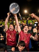 20 October 2023; Galway United players Stephen Walsh, left, and Darren Clarke celebrate with the SSE Airtricity Men's First Division cup after the SSE Airtricity Men's First Division match between Galway United and Wexford at Eamonn Deacy Park in Galway. Photo by Stephen McCarthy/Sportsfile