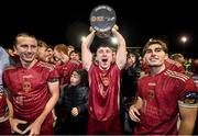 20 October 2023; Galway United players, from left, David Hurley, Ed McCarthy and Ronan Manning celebrate with the SSE Airtricity Men's First Division cup after the SSE Airtricity Men's First Division match between Galway United and Wexford at Eamonn Deacy Park in Galway. Photo by Stephen McCarthy/Sportsfile