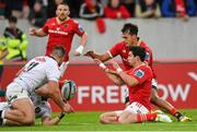 21 October 2023; Antoine Frisch of Munster, behind, supported by teammate Joey Carbery, before touching down to score his side's third try, during the United Rugby Championship match between Munster and Hollywoodbets Sharks at Thomond Park in Limerick. Photo by Seb Daly/Sportsfile