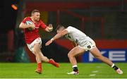 21 October 2023; Andrew Conway of Munster in action against Marnus Potgieter of Hollywoodbets Sharks during the United Rugby Championship match between Munster and Hollywoodbets Sharks at Thomond Park in Limerick. Photo by Seb Daly/Sportsfile