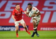 21 October 2023; Vincent Tshituka of Hollywoodbets Sharks is tackled by Andrew Conway during the United Rugby Championship match between Munster and Hollywoodbets Sharks at Thomond Park in Limerick. Photo by Seb Daly/Sportsfile