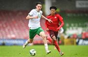 17 October 2023; Luke O'Donnell of Republic of Ireland in action against Enrique Aguilar of Switzerland during the UEFA European U17 Championship qualifying group 10 match between Switzerland and Republic of Ireland at Turner's Cross in Cork. Photo by Eóin Noonan/Sportsfile