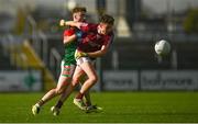 22 October 2023; Oisín Cregg of Boyle in action against Paul McGrath of St Brigids during the Roscommon County Senior Club Football Championship final match between St Brigids and Boyle at Dr Hyde Park in Roscommon. Photo by Harry Murphy/Sportsfile