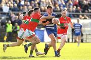 22 October 2023; Dan Cooney of Blessington in action against Gary Byrne, Sam O'Dowd and Fionn O'Sullivan of Rathnew during the Wicklow County Senior Club Football Championship final between Blessington and Rathnew at Echelon Park in Aughrim, Wicklow. Photo by Matt Browne/Sportsfile