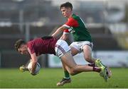 22 October 2023; Oisín Cregg of Boyle in action against Robbie Dolan of St Brigids during the Roscommon County Senior Club Football Championship final match between St Brigids and Boyle at Dr Hyde Park in Roscommon. Photo by Harry Murphy/Sportsfile