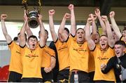 22 October 2023; Clonlara captain Jathan McMahon lifts the cup after the Clare County Senior Club Hurling Championship final between Clonlara and Crusheen at Cusack Park in Ennis, Clare. Photo by Eóin Noonan/Sportsfile