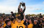 22 October 2023; Clonlara kitman John McGuinness lifting the cup after the Clare County Senior Club Hurling Championship final between Clonlara and Crusheen at Cusack Park in Ennis, Clare. Photo by Eóin Noonan/Sportsfile