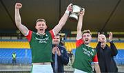 22 October 2023; St Brigids co-captains Mark Daly, left, and Paul McGrath lift the cup after their side's victory in the Roscommon County Senior Club Football Championship final match between St Brigids and Boyle at Dr Hyde Park in Roscommon. Photo by Harry Murphy/Sportsfile