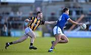 22 October 2023; Stefan Campbell of Clan na Gael evades the tackle of Callum Cumisky of Crossmaglen Rangers during the Armagh County Senior Club Football Championship final between Clan na Gael and Crossmaglen Rangers at BOX-IT Athletic Grounds in Armagh. Photo by Ben McShane/Sportsfile