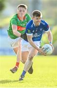 22 October 2023; Joe Dillon of Kingscourt Stars in action against Robbie Fitzpatrick of Gowna during the Cavan County Senior Club Football Championship final between Kingscourt Stars and Gowna at Kingspan Breffni in Cavan. Photo by Tyler Miller/Sportsfile