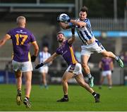 22 October 2023; Michael Darragh MacAuley of Ballyboden St Endas in action against Shane Horan of Kilmacud Crokes during the Dublin County Senior Club Football Championship Final between Kilmacud Crokes and Ballyboden St Endas at Parnell Park in Dublin. Photo by Brendan Moran/Sportsfile