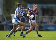22 October 2023; Shane Cunningham of Kilmacud Crokes in action against Shane Clayton of Ballyboden St Endas during the Dublin County Senior Club Football Championship final between Kilmacud Crokes and Ballyboden St Endas at Parnell Park in Dublin. Photo by Daire Brennan/Sportsfile
