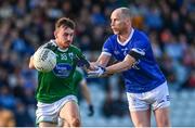22 October 2023; Anthony Thompson of Naomh Conaill in action against Gary Mac Pháidín of Gaoth Dobhair during the Donegal County Senior Club Football Championship final between Gaoth Dobhair and Naomh Conaill at MacCumhaill Park in Ballybofey, Donegal. Photo by Ramsey Cardy/Sportsfile