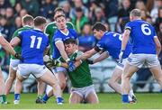 22 October 2023; Mícheál O Cearbhaill of Gaoth Dobhair under pressure from Gaoth Dobhair players during the Donegal County Senior Club Football Championship final between Gaoth Dobhair and Naomh Conaill at MacCumhaill Park in Ballybofey, Donegal. Photo by Ramsey Cardy/Sportsfile