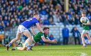 22 October 2023; Seaghán Ó Fearraigh of Gaoth Dobhair in action against Jason Campbell of Naomh Conaill during the Donegal County Senior Club Football Championship final between Gaoth Dobhair and Naomh Conaill at MacCumhaill Park in Ballybofey, Donegal. Photo by Ramsey Cardy/Sportsfile