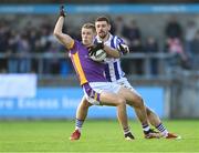 22 October 2023; Paul Mannion of Kilmacud Crokes in action against James Holland of Ballyboden St Endas during the Dublin County Senior Club Football Championship final between Kilmacud Crokes and Ballyboden St Endas at Parnell Park in Dublin. Photo by Daire Brennan/Sportsfile