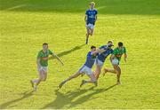 22 October 2023; Ryan Donohoe of Gowna contests the throw in against Peter Corrigan, left, and Padraig Faulkner of Kingscourt Stars during the Cavan County Senior Club Football Championship final between Kingscourt Stars and Gowna at Kingspan Breffni in Cavan. Photo by Tyler Miller/Sportsfile