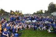 22 October 2023; Scotstown players and supporters celebrate with cup after the Monaghan County Senior Club Football Championship final between Inniskeen and Scotstown at St Tiernach's Park in Clones, Monaghan. Photo by Philip Fitzpatrick/Sportsfile