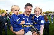22 October 2023; Darren Hughes of Scotstown with his children Ava, age 2 and Cillian, age 5, after the Monaghan County Senior Club Football Championship final between Inniskeen and Scotstown at St Tiernach's Park in Clones, Monaghan. Photo by Philip Fitzpatrick/Sportsfile