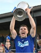 22 October 2023; Ardee St Mary's captain Dáire McConnon lifts the Joe Ward Cup after the Louth County Senior Club Football Championship final between Ardee St Mary's and Naomh Mairtin at Pairc Naomh Bríd in Dowdallshill, Louth. Photo by Stephen Marken/Sportsfile