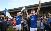 22 October 2023; Ardee St Mary's captain Dáire McConnon and Tadhg McDonnell lift the Joe Ward Cup after the Louth County Senior Club Football Championship final between Ardee St Mary's and Naomh Mairtin at Pairc Naomh Bríd in Dowdallshill, Louth. Photo by Stephen Marken/Sportsfile
