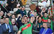 22 October 2023; Ryan McGahern of Gowna celebrates with the trophy after his side's victory in the Cavan County Senior Club Football Championship final between Kingscourt Stars and Gowna at Kingspan Breffni in Cavan. Photo by Tyler Miller/Sportsfile