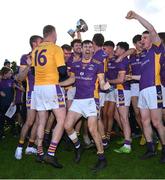 22 October 2023; Aidan Jones of Kilmacud Crokes, centre, and teammates celebrate with the Clery's cup after the Dublin County Senior Club Football Championship Final between Kilmacud Crokes and Ballyboden St Endas at Parnell Park in Dublin. Photo by Brendan Moran/Sportsfile