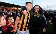 22 October 2023; Rian O'Neill of Crossmaglen Rangers celebrates with a supporter after the Armagh County Senior Club Football Championship final between Clan na Gael and Crossmaglen Rangers at BOX-IT Athletic Grounds in Armagh. Photo by Ben McShane/Sportsfile