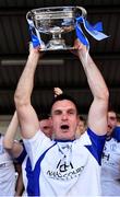 22 October 2023; Naas captain Eoin Doyle lifts the Dermot Bourke cup after his side's victory in the Kildare County Senior Club Football Championship final between Celbridge and Naas at Netwatch Cullen Park in Carlow. Photo by Piaras Ó Mídheach/Sportsfile