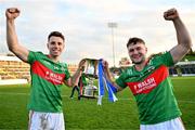 22 October 2023; Conor Madden of Gowna, left, and team-mate Oisin Pierson celebrate with the trophy after their side's victory in the Cavan County Senior Club Football Championship final between Kingscourt Stars and Gowna at Kingspan Breffni in Cavan. Photo by Tyler Miller/Sportsfile