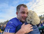 22 October 2023; Jack McCarron celebrates with his mother Patricia after the Monaghan County Senior Club Football Championship final between Inniskeen and Scotstown at St Tiernach's Park in Clones, Monaghan. Photo by Philip Fitzpatrick/Sportsfile