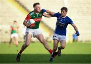 22 October 2023; Andrew McNulty of Inniskeen in action against Damien McArdle of Scotstown during the Monaghan County Senior Club Football Championship final between Inniskeen and Scotstown at St Tiernach's Park in Clones, Monaghan. Photo by Philip Fitzpatrick/Sportsfile