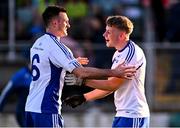22 October 2023; Naas players Eoin Doyle, left, and Mark Maguire celebrate after their side's victory in the Kildare County Senior Club Football Championship final between Celbridge and Naas at Netwatch Cullen Park in Carlow. Photo by Piaras Ó Mídheach/Sportsfile