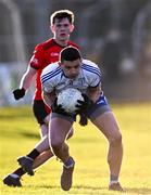 22 October 2023; Eamonn Callaghan of Naas in action against Peter McAteer of Celbridge during the Kildare County Senior Club Football Championship final between Celbridge and Naas at Netwatch Cullen Park in Carlow. Photo by Piaras Ó Mídheach/Sportsfile