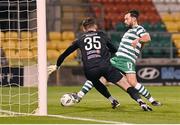 22 October 2023; Richie Towell of Shamrock Rovers shoots to score his side's second goal past Drogheda United goalkeeper Andrew Wogan during the SSE Airtricity Men's Premier Division match between Shamrock Rovers and Drogheda United at Tallaght Stadium in Dublin. Photo by Stephen McCarthy/Sportsfile